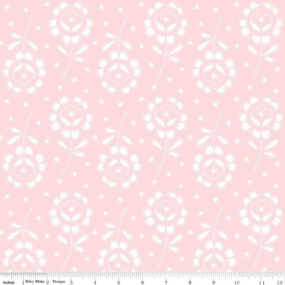 Image of the Sewing Seeds III Rose Cutwork Pink quilting cotton fabric by Lori Holt for Riley Blake Designs. Features flowers on a pink background. Cute Little Fabric Shop