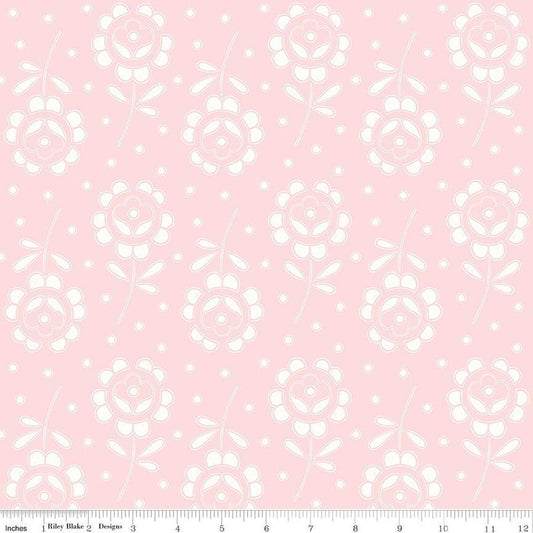 Image of the Sewing Seeds III Rose Cutwork Pink quilting cotton fabric by Lori Holt for Riley Blake Designs. Features flowers on a pink background. Cute Little Fabric Shop