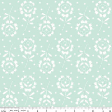 Image of the Sewing Seeds III Rose Cutwork Aqua quilting cotton fabric by Lori Holt for Riley Blake Designs. Features flowers on a pink background. Cute Little Fabric Shop