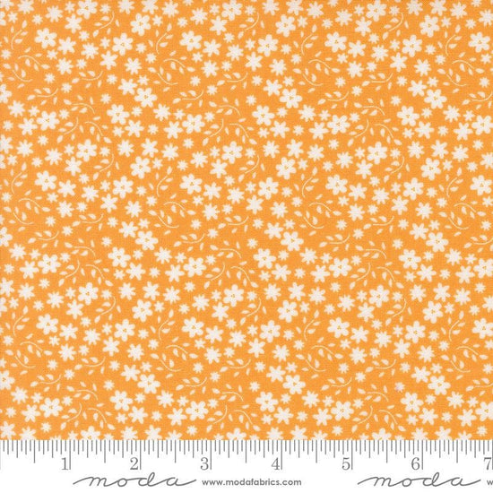 Image of the Raspberry Summer Blossoms Apricot quilting cotton fabric by Sherri & Chelsi for Moda Fabrics. Features flowers on a yellow background. Cute Little Fabric Shop