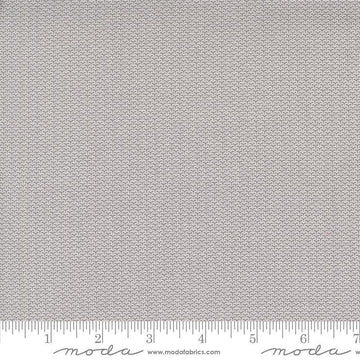 Image of the Itty Bitty Background Gatherings Diamond Gray quilting cotton fabric by Moda Fabrics. Features diamonds on a gray background. Cute Little Fabric Shop