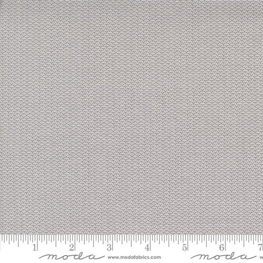 Image of the Itty Bitty Background Gatherings Diamond Gray quilting cotton fabric by Moda Fabrics. Features diamonds on a gray background. Cute Little Fabric Shop