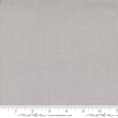Image of the Itty Bitty Background Gatherings Diamond Gray quilting cotton fabric by Moda Fabrics. Features diamonds on a gray background. Cute Little Fabric Shop