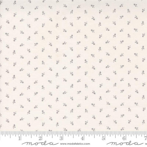Image of the Itty Bitty Background Gatherings Tiny Grey quilting cotton fabric by Moda Fabrics. Features flowers on a gray background. Cute Little Fabric Shop