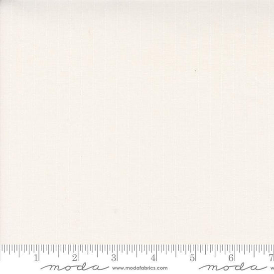 Image of the Itty Bitty Background Gatherings Dotted Off White Wh quilting cotton fabric by Moda Fabrics. Features dotted lines on a white background. Cute Little Fabric Shop