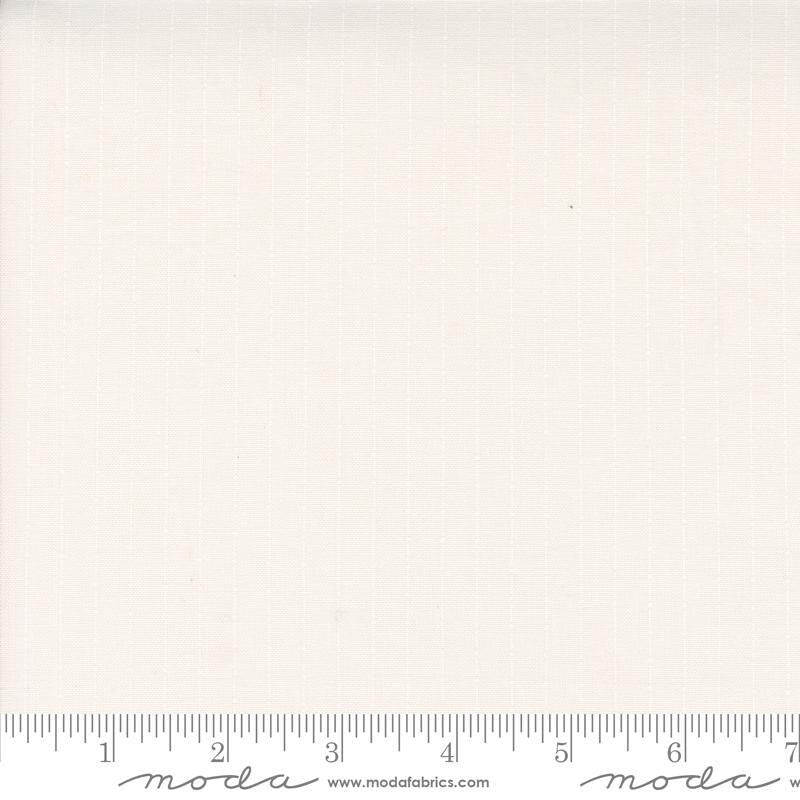 Image of the Itty Bitty Background Gatherings Dotted Off White Wh quilting cotton fabric by Moda Fabrics. Features dotted lines on a white background. Cute Little Fabric Shop