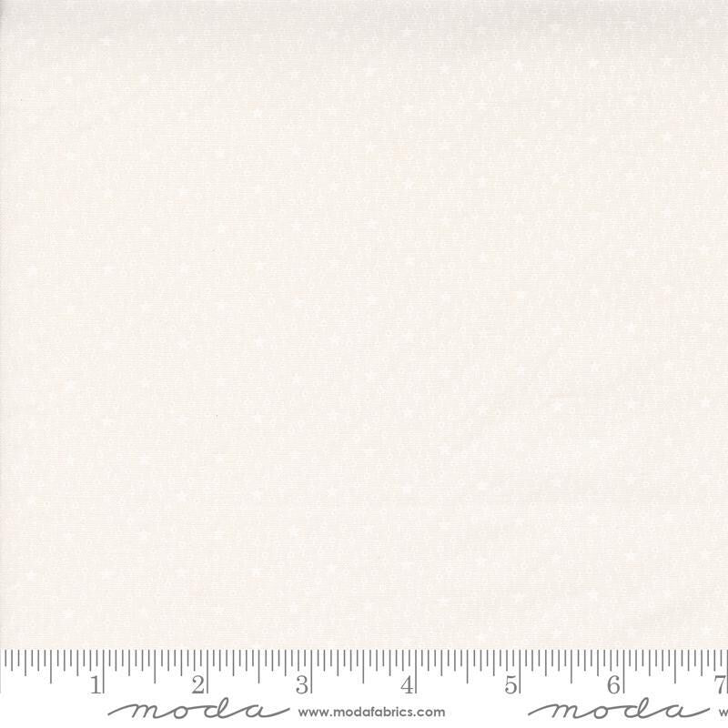 Image of the Itty Bitty Background Gatherings Starfield Off White Wh quilting cotton fabric by Moda Fabrics. Features stars on a white background. Cute Little Fabric Shop