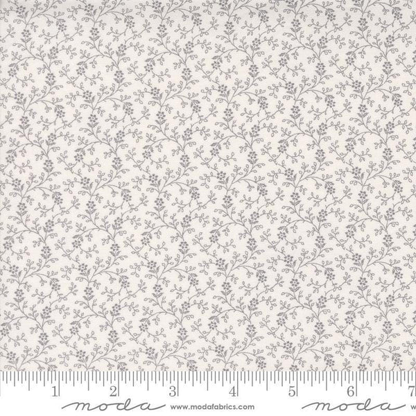 Image of the Itty Bitty Background Gatherings Flowers Grey quilting cotton fabric by Moda Fabrics. Features vines on a gray background. Cute Little Fabric Shop