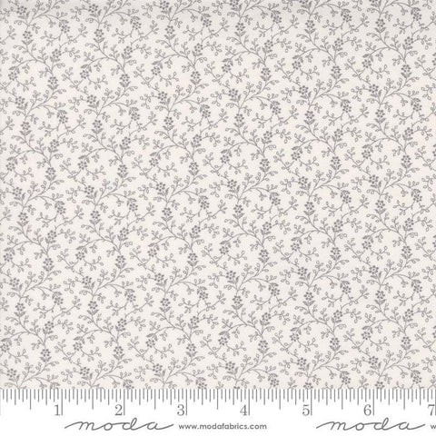 Image of the Itty Bitty Background Gatherings Flowers Grey quilting cotton fabric by Moda Fabrics. Features vines on a gray background. Cute Little Fabric Shop