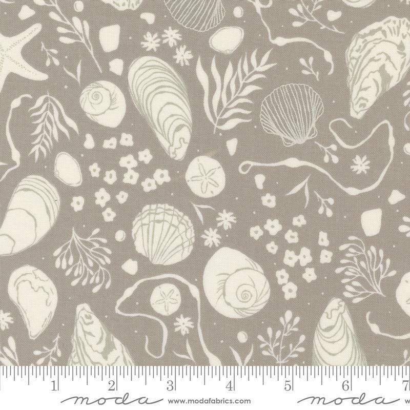 Image of the Seaglass Summer Tide Pool Sandstone quilting cotton fabric by Moda Fabrics. Features damask on a tan background. Cute Little Fabric Shop