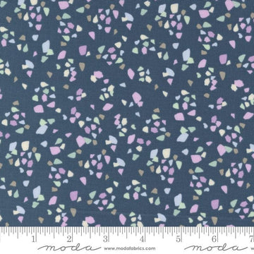 Image of the Seaglass Summer Pebble Indigo Sea quilting cotton fabric by Moda Fabrics. Features shapes on a navy blue background. Cute Little Fabric Shop