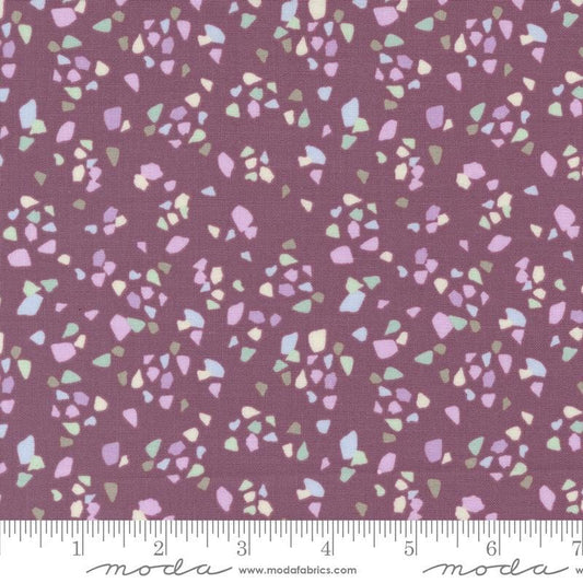 Image of the Seaglass Summer Pebble Beach Plum quilting cotton fabric by Moda Fabrics. Features shapes on a purple background. Cute Little Fabric Shop