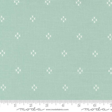 Image of the Seaglass Summer Cross Ocean AIr quilting cotton fabric by Moda Fabrics. Features crosses on a mint background. Cute Little Fabric Shop