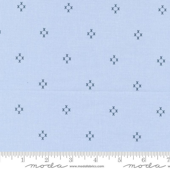 Image of the Seaglass Summer Cross Dappled Blue quilting cotton fabric by Moda Fabrics. Features crosses on a blue background. Cute Little Fabric Shop