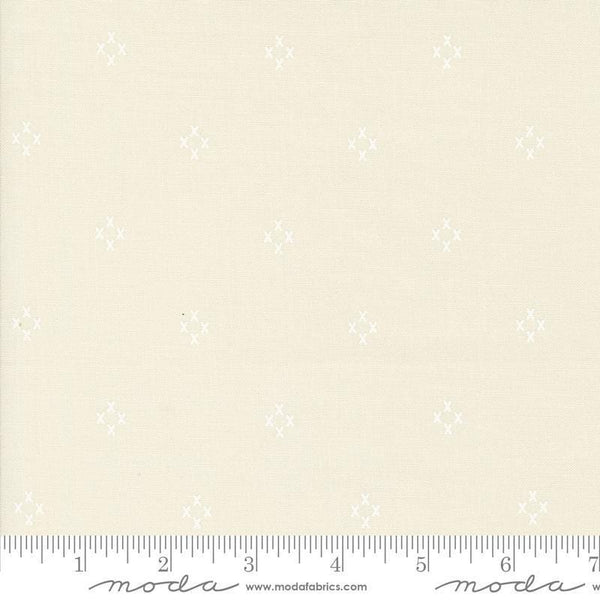 Image of the Seaglass Summer Cross Oyster White quilting cotton fabric by Moda Fabrics. Features crosses on a cream background. Cute Little Fabric Shop