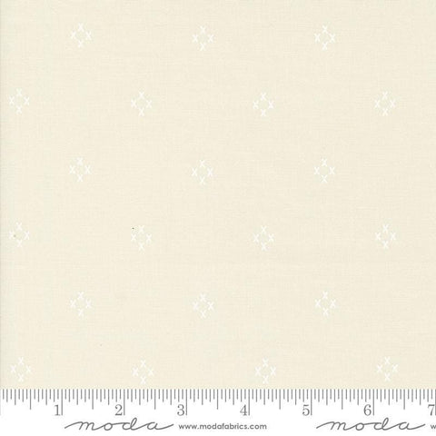Image of the Seaglass Summer Cross Oyster White quilting cotton fabric by Moda Fabrics. Features crosses on a cream background. Cute Little Fabric Shop