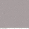 Image of the Wide Back Dapple Dot Riley Gray quilting cotton fabric by Riley Blake Designs. Features small white dots on a gray. 
Cute Little Fabric Shop