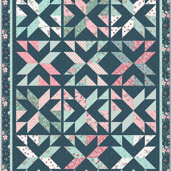 Image of the Stacking Stars quilt pattern by Beverly McCullough for Riley Blake Designs. Features stars on a quilt. 
Cute Little Fabric Shop