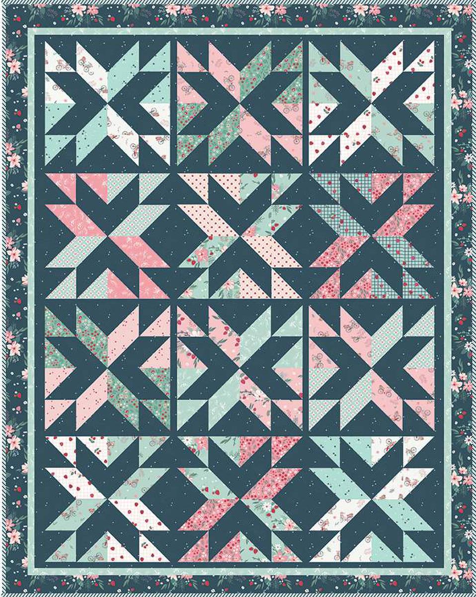 Image of the Stacking Stars quilt pattern by Beverly McCullough for Riley Blake Designs. Features stars on a quilt. 
Cute Little Fabric Shop
