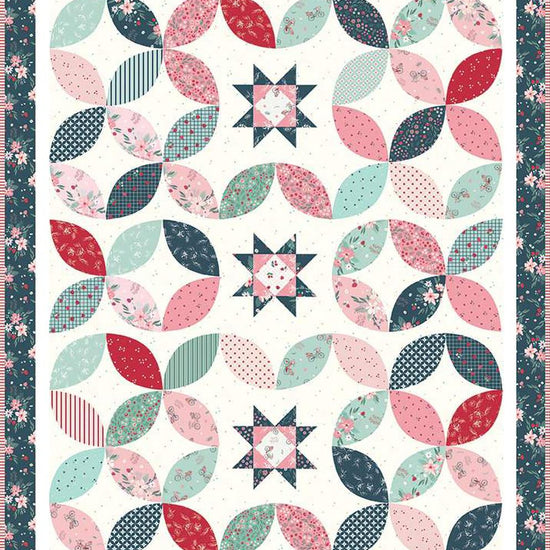 Image of the Stacking Stars quilt pattern by Beverly McCullough for Riley Blake Designs. Features stars on a quilt. 
Cute Little Fabric Shop