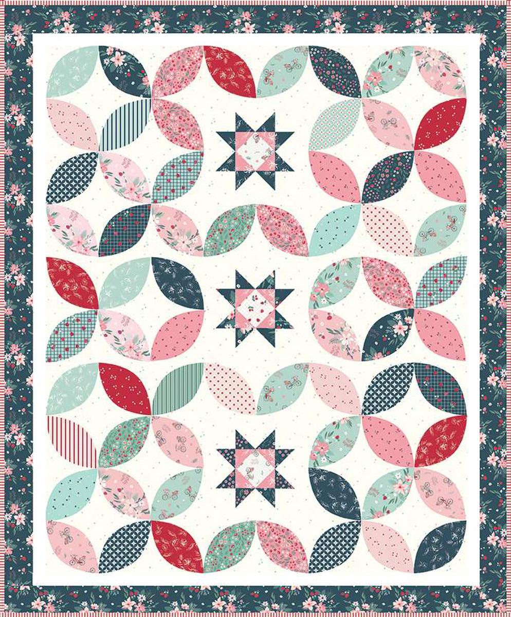 Image of the Stacking Stars quilt pattern by Beverly McCullough for Riley Blake Designs. Features stars on a quilt. 
Cute Little Fabric Shop