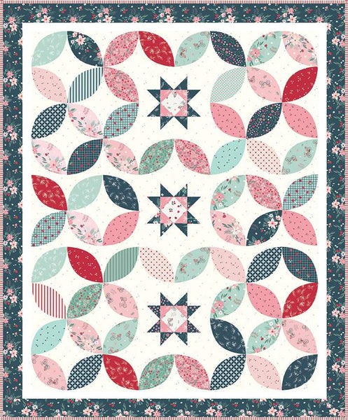 Image of the Stacking Stars quilt pattern by Beverly McCullough for Riley Blake Designs. Features stars on a quilt. 
Cute Little Fabric Shop