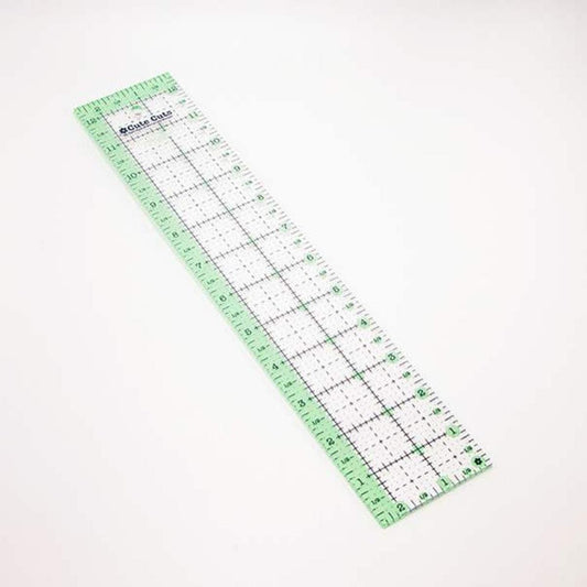 Image of the Lori Holt Cute Cuts™ Ruler 2 1/2" x 12 1/2 by Riley Blake Designs. Features a green ruler. 
Cute Little Fabric Shop