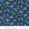 Image of the Flower Patches Vintage Midnight quilting cotton fabric by Amarilys Henderson for Moda Fabrics. Features flowers on a blue background. Cute Little Fabric Shop