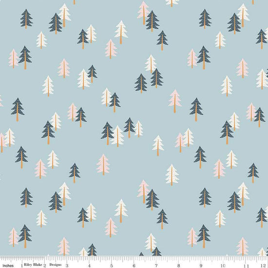 Image of the Forest Village Spruce Forest Sky quilting cotton fabric by Little Forest Atelier for Riley Blake Designs. Features trees on a blue background. Cute Little Fabric Shop