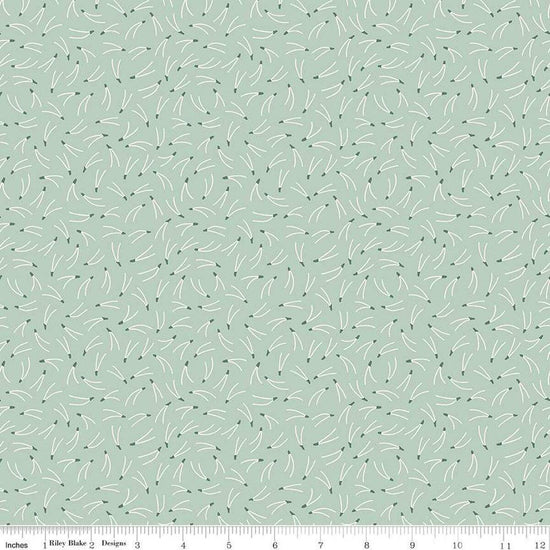 Image of the Forest Village Needles Sage quilting cotton fabric by Little Forest Atelier for Riley Blake Designs. Features a pine needles on a green background. Cute Little Fabric Shop
