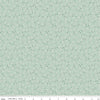 Image of the Forest Village Needles Sage quilting cotton fabric by Little Forest Atelier for Riley Blake Designs. Features a pine needles on a green background. Cute Little Fabric Shop
