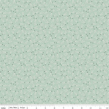 Image of the Forest Village Needles Sage quilting cotton fabric by Little Forest Atelier for Riley Blake Designs. Features a pine needles on a green background. Cute Little Fabric Shop
