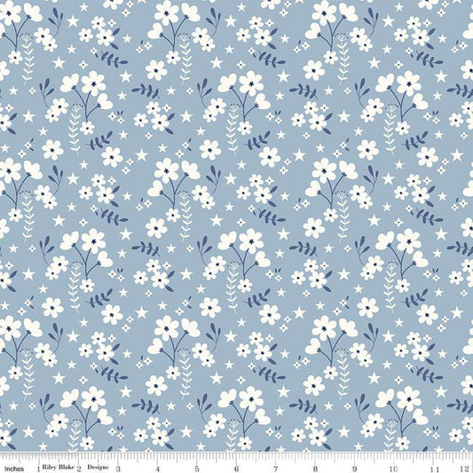 Image of the Freedom Garden Ditsy Floral Sky quilting cotton fabric by My Mind's Eye for Riley Blake Designs. Features flowers on a blue background. Cute Little Fabric Shop