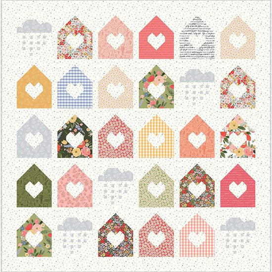 Image of the Silver Lining Quilt Boxed Kit by Riley Blake Designs. Features houses with hearts in the center on a quilt. 
Cute Little Fabric Shop