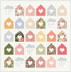 Image of the Silver Lining Quilt Boxed Kit by Riley Blake Designs. Features houses with hearts in the center on a quilt. 
Cute Little Fabric Shop