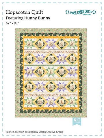 Image of the Hopscotch quilt pattern by Sager Creek Quilts for QT Fabrics. Features bunnies on a quilt. 
Cute Little Fabric Shop