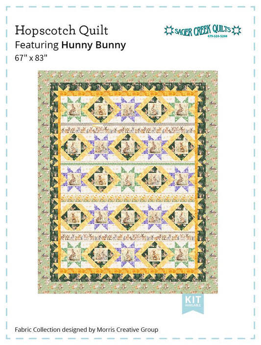 Image of the Hopscotch quilt pattern by Sager Creek Quilts for QT Fabrics. Features bunnies on a quilt. 
Cute Little Fabric Shop