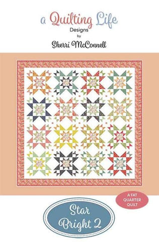 Image of the Star Bright 2 quilt pattern by Sherri McConnell for Moda Fabrics. Features a flower quilt pattern. 
Cute Little Fabric Shop