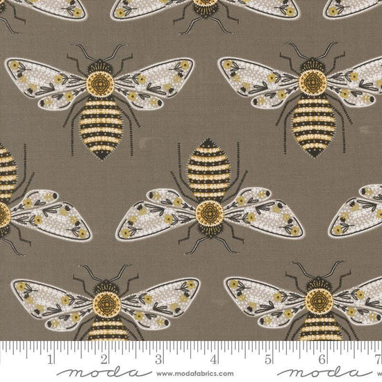 Image of the Bee Garden Metallic Bumblebee Slate quilting cotton fabric by Gingiber for Riley Blake Designs. Features bees on a brown background. Cute Little Fabric Shop