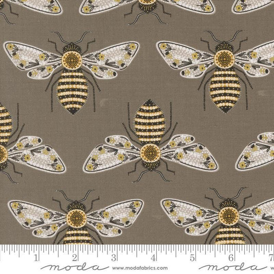 Image of the Bee Garden Metallic Bumblebee Slate quilting cotton fabric by Gingiber for Riley Blake Designs. Features bees on a brown background. Cute Little Fabric Shop