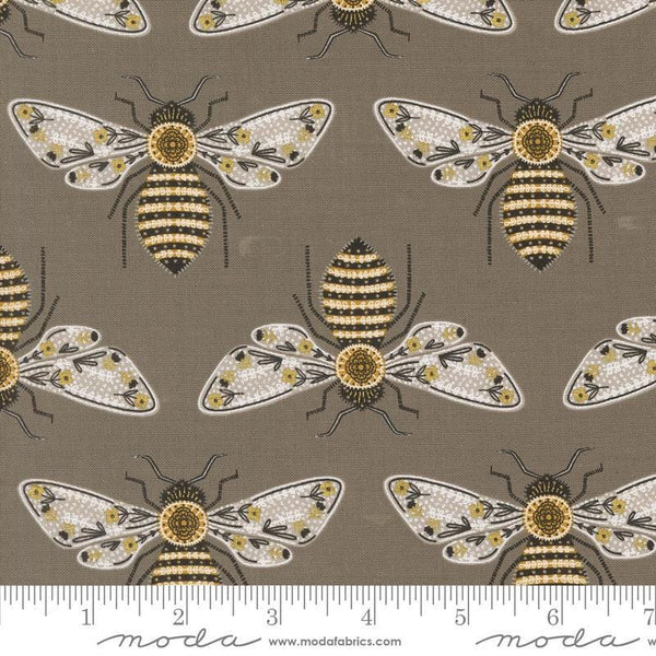 Image of the Bee Garden Metallic Bumblebee Slate quilting cotton fabric by Gingiber for Riley Blake Designs. Features bees on a brown background. Cute Little Fabric Shop