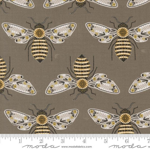 Image of the Bee Garden Metallic Bumblebee Slate quilting cotton fabric by Gingiber for Riley Blake Designs. Features bees on a brown background. Cute Little Fabric Shop