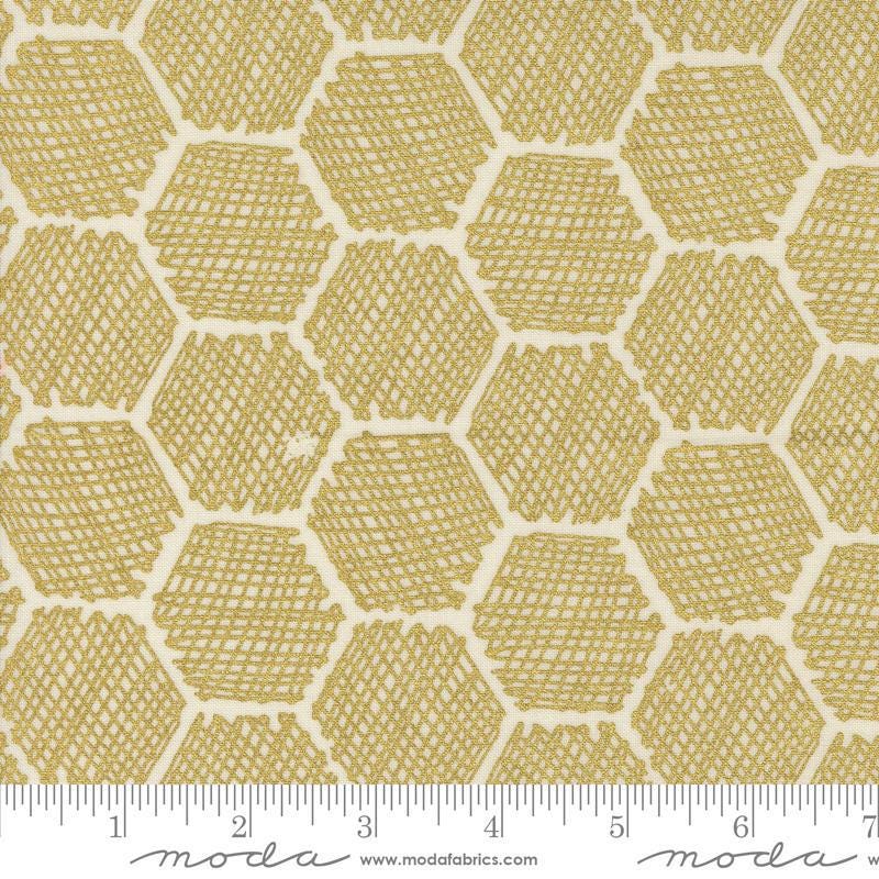 Image of the Bee Garden Metallic Honeycomb Porcelain quilting cotton fabric by Gingiber for Riley Blake Designs. Features honeycomb on a yellow background. Cute Little Fabric Shop