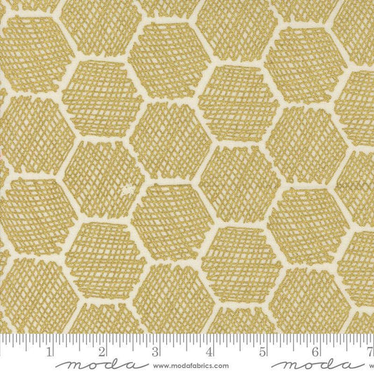 Image of the Bee Garden Metallic Honeycomb Porcelain quilting cotton fabric by Gingiber for Riley Blake Designs. Features honeycomb on a yellow background. Cute Little Fabric Shop