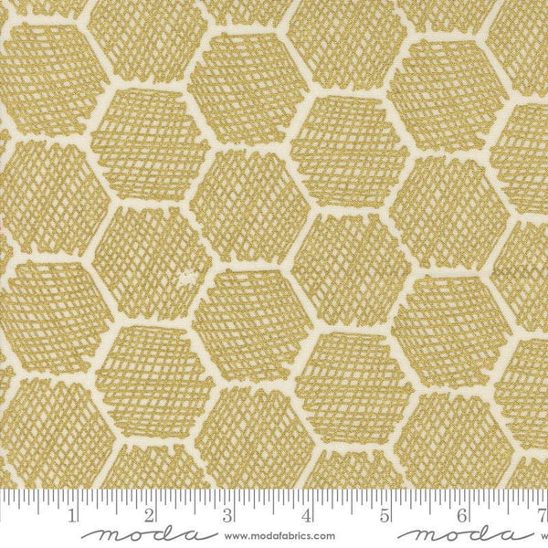 Image of the Bee Garden Metallic Honeycomb Porcelain quilting cotton fabric by Gingiber for Riley Blake Designs. Features honeycomb on a yellow background. Cute Little Fabric Shop