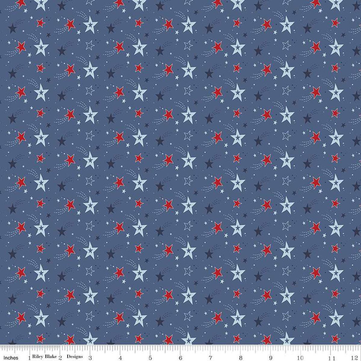 Image of the Stars and Stripes Forever Shooting Stars Blue quilting cotton fabric by Lori Whitlock for Riley Blake Designs. Features stars on a blue background. Cute Little Fabric Shop