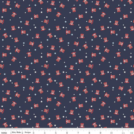 Image of the Stars and Stripes Forever Hats Navy quilting cotton fabric by Lori Whitlock for Riley Blake Designs. Features hats on a navy blue background. Cute Little Fabric Shop