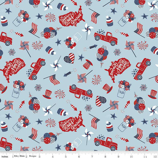 Image of the Stars and Stripes Forever Main Sky quilting cotton fabric by Lori Whitlock for Riley Blake Designs. Features patriotic things on a blue background. Cute Little Fabric Shop
