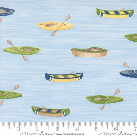 Image of the On Lake Time Canoes Sky Blue quilting cotton fabric by Deb Strain for Moda Fabrics. Features canoes on a blue background. Cute Little Fabric Shop