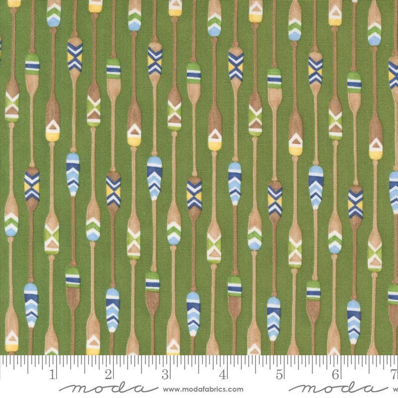 Image of the On Lake Time Paddles Evergreen quilting cotton fabric by Deb Strain for Moda Fabrics. Features paddles on a green background. Cute Little Fabric Shop
